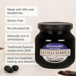 Jar of La Vieja Fabrica blueberry marmelade with product details on a beige background