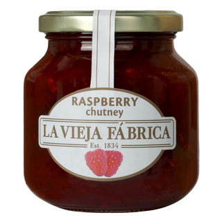 Jar of raspberry chutney with 'La Vieja Fábrica' label on a white background